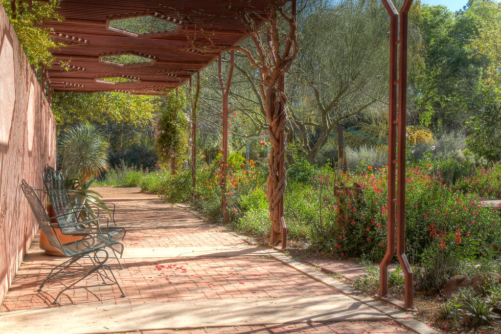 covered pathway through the demonstration garden